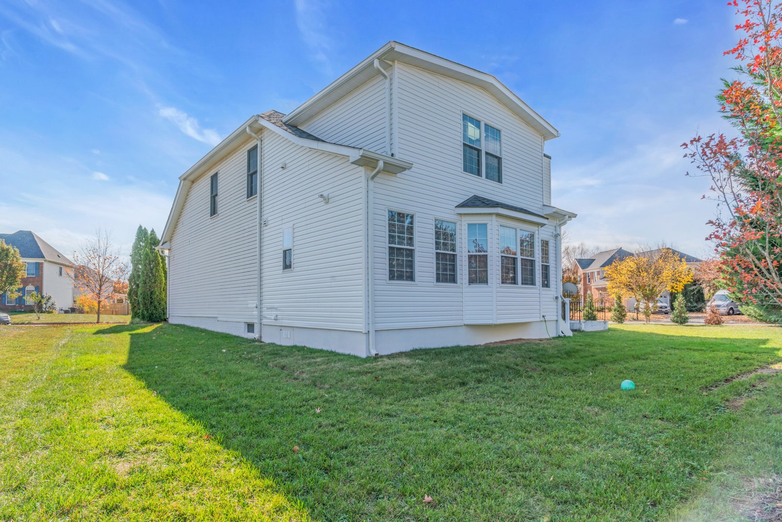 Completed Oatlands Grove home addition with siding and roofline matched to the original house
